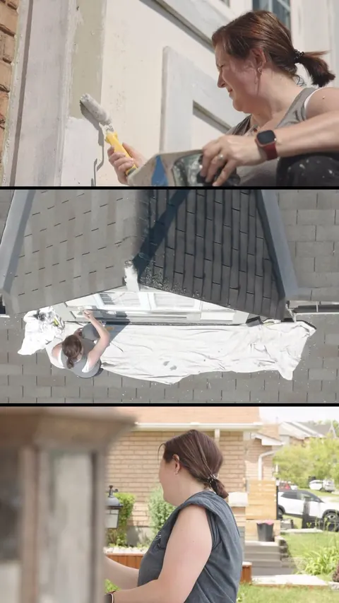Melissa painting exterior trim, with protective drop cloths over the roof