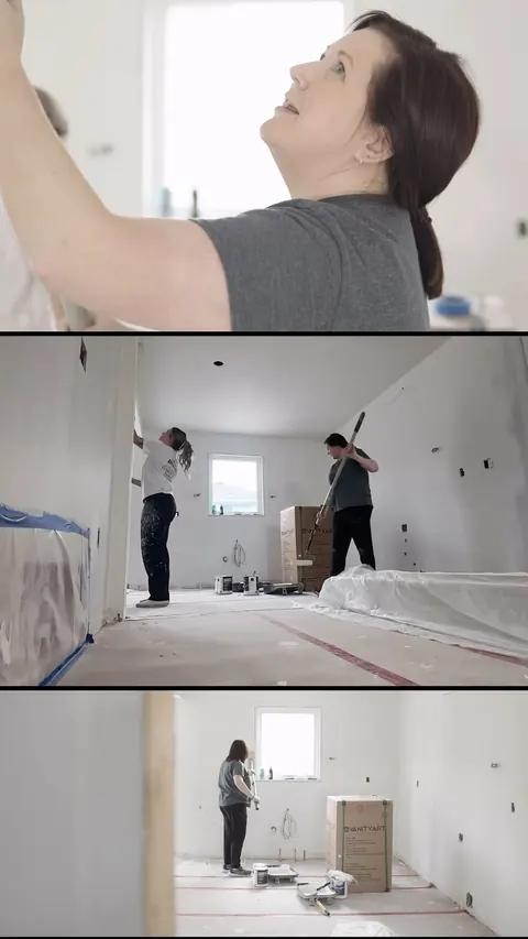 Behind the scenes: the crew painting a bright room